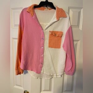 Boutique color block button up top in a size medium